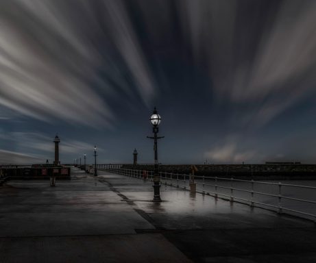 Whitby pier at dusk.