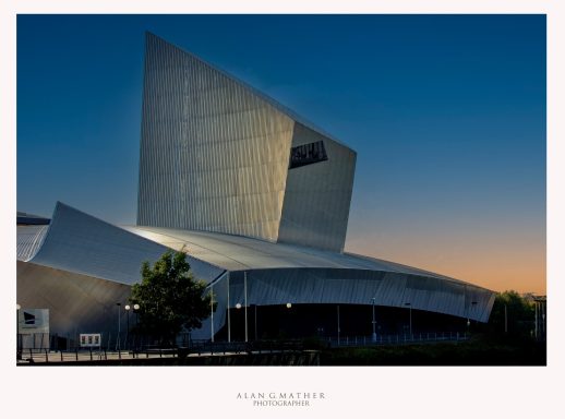 Dusk, The Imperial War Museum, Salford Quays, Manchester, UK.
