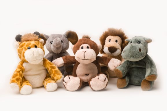 Animal soft toys on white background